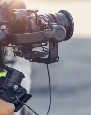 Motorized Gimbal, people using digital camera with anti shake for video production scene stabilizer